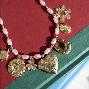 Gold and peal Charm Necklace